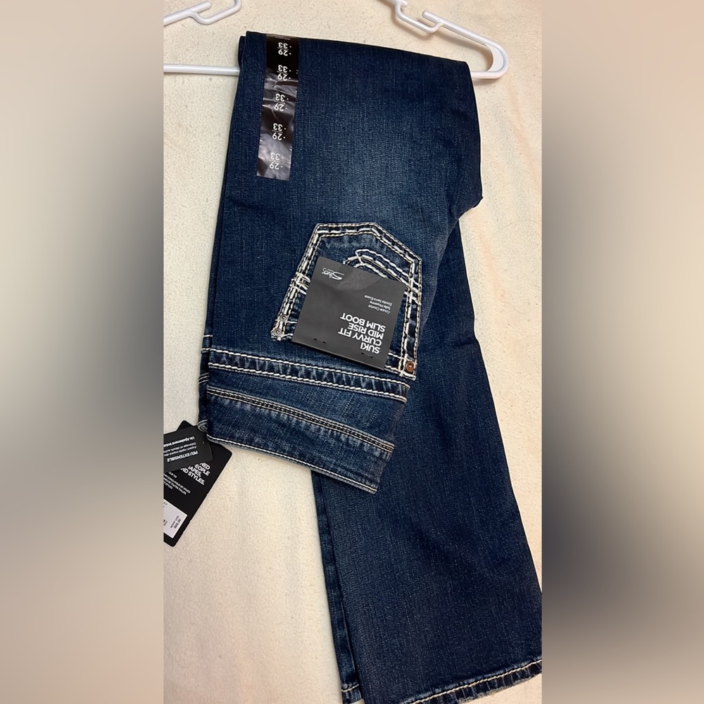 2 pair of brand new Silver Suki bootcut jeans. Never worn both with tags.